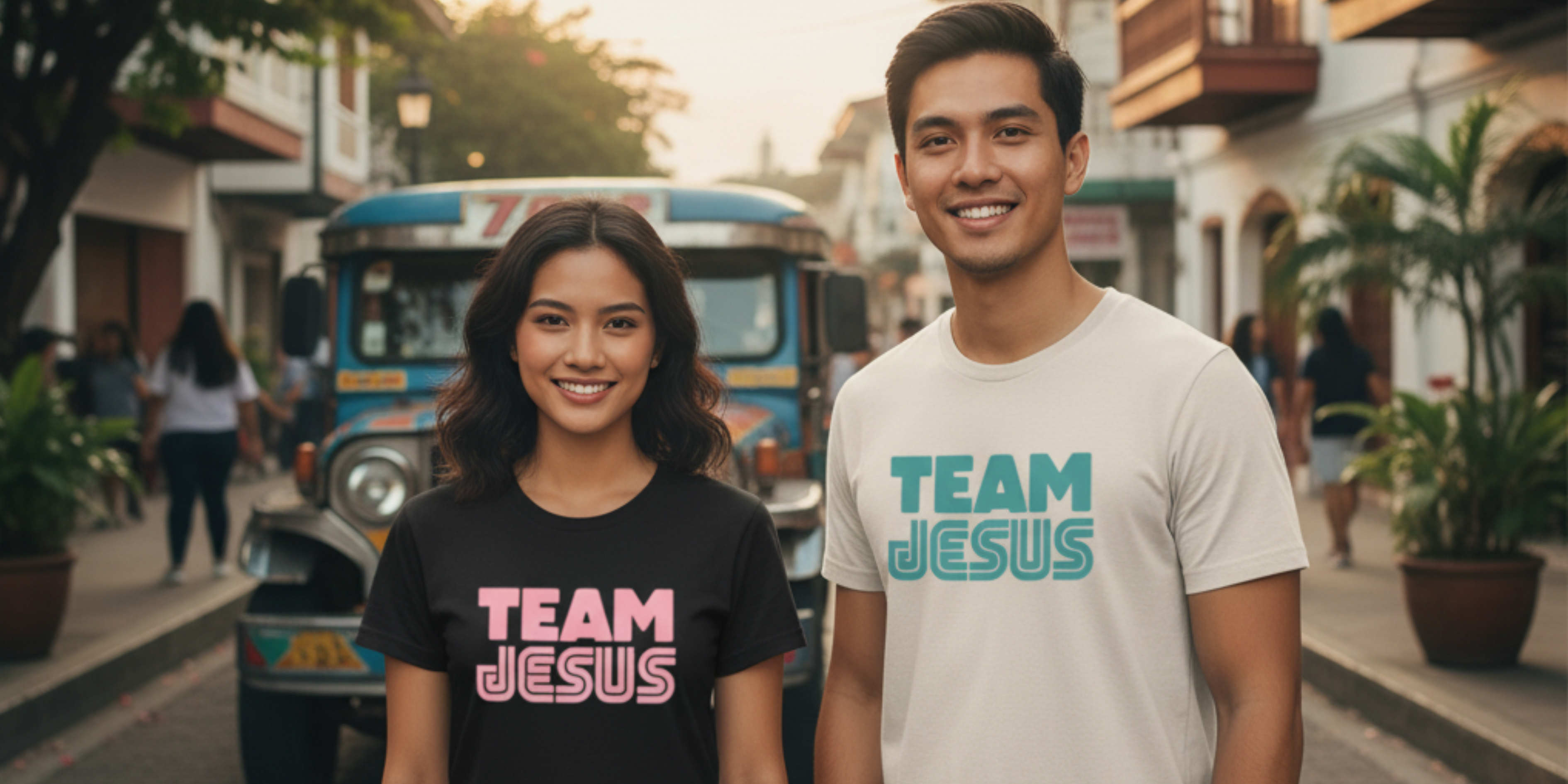 Two people wearing 'Team Jesus' shirts standing on a street with a bus in the background.